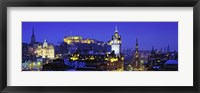 Framed Buildings lit up at night with a castle in the background, Edinburgh Castle, Edinburgh, Scotland