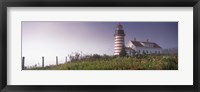Framed Low angle view of a lighthouse, West Quoddy Head lighthouse, Lubec, Washington County, Maine, USA