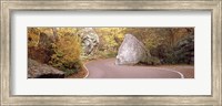 Framed Road curving around a big boulder, Stowe, Lamoille County, Vermont, USA