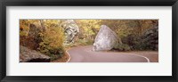 Framed Road curving around a big boulder, Stowe, Lamoille County, Vermont, USA