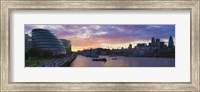 Framed City hall with office buildings at sunset, Thames River, London, England