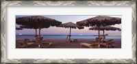 Framed Lounge chairs with sunshades on the beach, Hilton Resort, Hurghada, Egypt