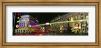 Framed Buildings lit up at night, Piccadilly Circus, London, England