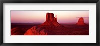 Framed East Mitten and West Mitten buttes at sunset, Monument Valley, Utah