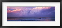 Framed Clouds over the sea at sunset