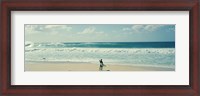 Framed Surfer standing on the beach, North Shore, Oahu, Hawaii