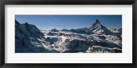 Framed Skiers on mountains in winter, Matterhorn, Switzerland