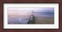 Framed Tide break on the beach at sunrise, Cape Hatteras National Seashore, North Carolina, USA