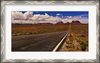 Framed Road passing through a valley, Monument Valley, San Juan County, Utah, USA