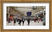 Framed Commuters at a railroad station, Waterloo Station, London, England