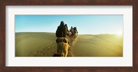 Framed Row of people riding camels through the desert, Sahara Desert, Morocco