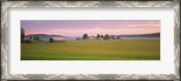 Framed Barn and wheat field across farmlands at dawn, Finland