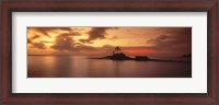 Framed Silhouette of a palm tree on an island at sunset, Anse Severe, La Digue Island, Seychelles