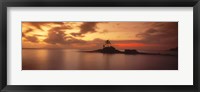 Framed Silhouette of a palm tree on an island at sunset, Anse Severe, La Digue Island, Seychelles