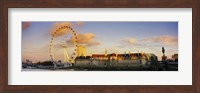 Framed Ferris wheel with buildings at waterfront, Millennium Wheel, London County Hall, Thames River, South Bank, London, England