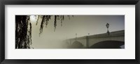 Framed Putney Bridge during fog, Thames River, London, England