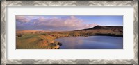 Framed Pond and warm evening light at Sharpitor, Dartmoor, Devon, England