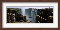 Framed Woman looking at the Victoria Falls from a viewing point, Zambia