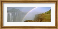 Framed Rainbow form in the spray created by the water cascading over the Victoria Falls, Zimbabwe