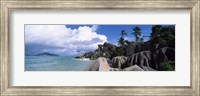 Framed Anse source d'Argent beach with Praslin Island in background, La Digue Island, Seychelles