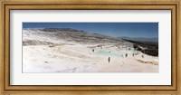 Framed Tourists enjoying the hot springs and travertine pool, Pamukkale, Denizli Province, Turkey