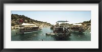 Framed Boats with people swimming in the Mediterranean sea, Kas, Antalya Province, Turkey