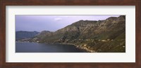Framed Road towards a mountain peak with town, Mt Chapman's Peak, Hout Bay, Cape Town, Western Cape Province, Republic of South Africa
