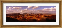 Framed Monument Valley Under Cloudy Sky