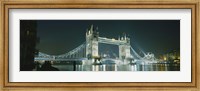 Framed Low angle view of a bridge lit up at night, Tower Bridge, London, England