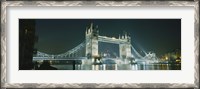 Framed Low angle view of a bridge lit up at night, Tower Bridge, London, England