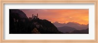 Framed Neuschwanstein Palace at dusk, Bavaria Germany