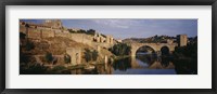Framed Castle at the waterfront, Puente de San Martin, Tajo River, Toledo, Spain