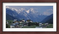 Framed High angle view of a village on a landscape and a mountain range in the background, St. Anton, Austria