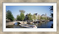Framed Netherlands, Amsterdam, tour boat in channel