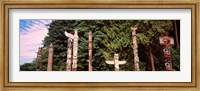 Framed Totem poles in a park, Stanley Park, Vancouver, British Columbia, Canada