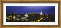 Framed High angle view of a city lit up at night, Edinburgh Castle, Edinburgh, Scotland