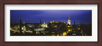 Framed High angle view of a city lit up at night, Edinburgh Castle, Edinburgh, Scotland