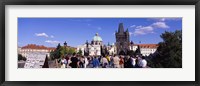 Framed Tourists walking in front of a building, Charles Bridge, Prague, Czech Republic