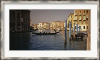 Framed Tourists sitting in a gondola, Grand Canal, Venice, Italy