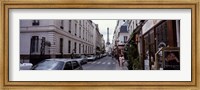 Framed Buildings along a street with the Eiffel Tower in the background, Paris, France