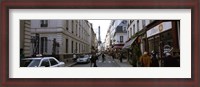 Framed Buildings along a street with a tower in the background, Rue Saint Dominique, Eiffel Tower, Paris, Ile-de-France, France