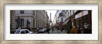 Framed Buildings along a street with a tower in the background, Rue Saint Dominique, Eiffel Tower, Paris, Ile-de-France, France