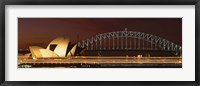 Framed Opera house lit up at night with light streaks, Sydney Harbor Bridge, Sydney Opera House, Sydney, New South Wales, Australia