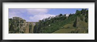 Framed Low angle view of a town, Tajo Bridge, Rio Guadalevin Gorge, Serrania De Ronda, Ronda, Andalusia, Spain