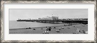Framed Tourists on the beach, Brighton, England