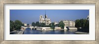 Framed Cathedral along a river, Notre Dame Cathedral, Seine River, Paris, France