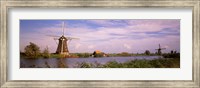 Framed Windmills at Dusk