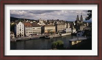 Framed High angle view of buildings along a river, River Limmat, Zurich, Switzerland