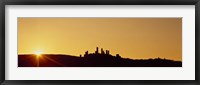 Framed Silhouette of a town on a hill at sunset, San Gimignano, Tuscany, Italy