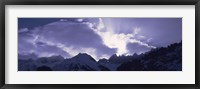 Framed Switzerland, Canton Glarus, View of clouds over snow covered peaks